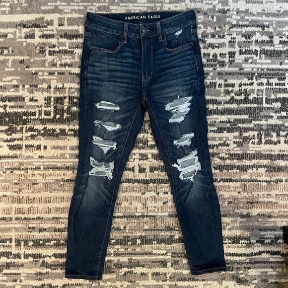 American Eagle | Highrise Next Level Stretch Destressed Dark Blue Jean - Picture 9 of 11